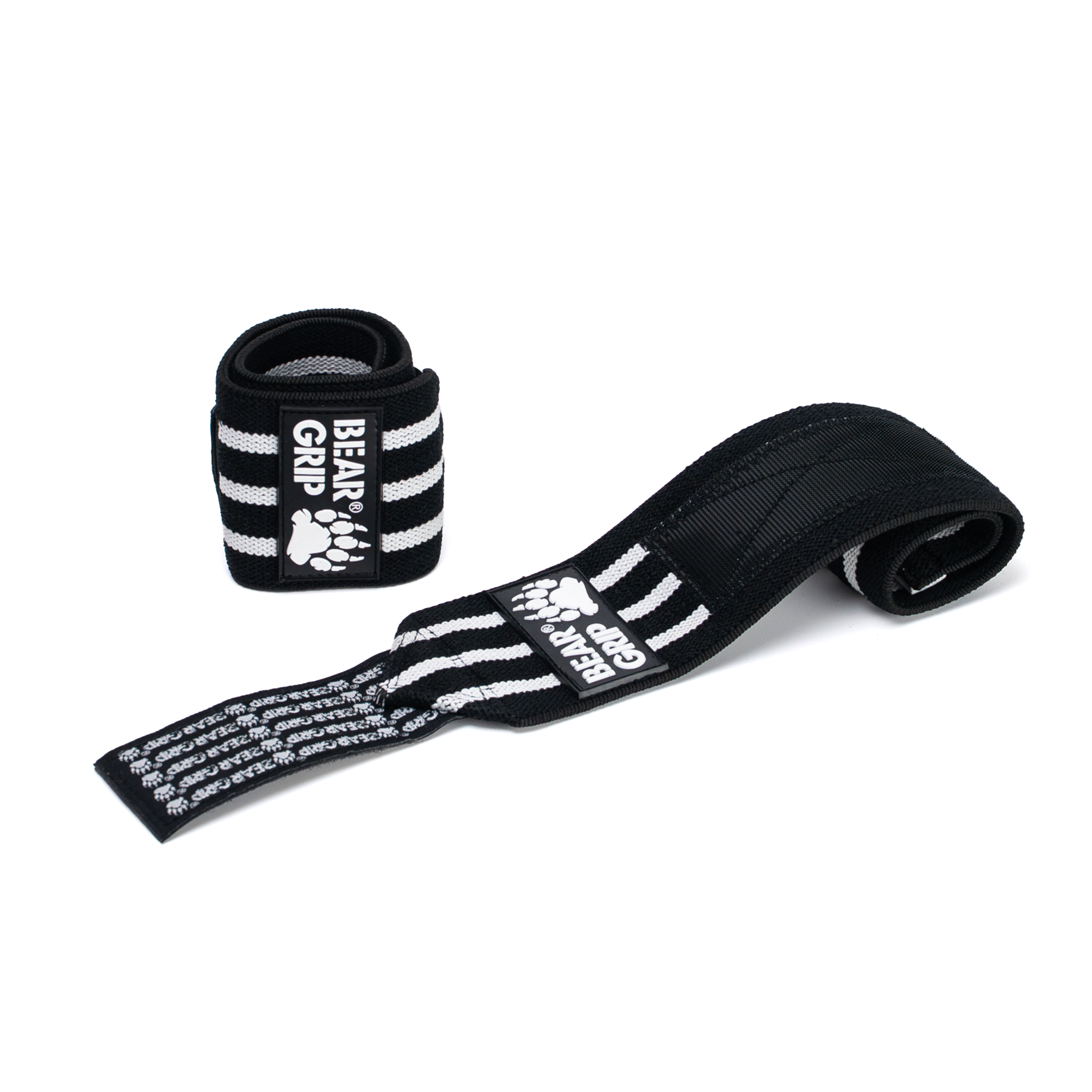 BEAR GRIP Black/White SE Tessellation wrist wraps, one upright and one laid flat, with textured straps and logo patch on a white background.