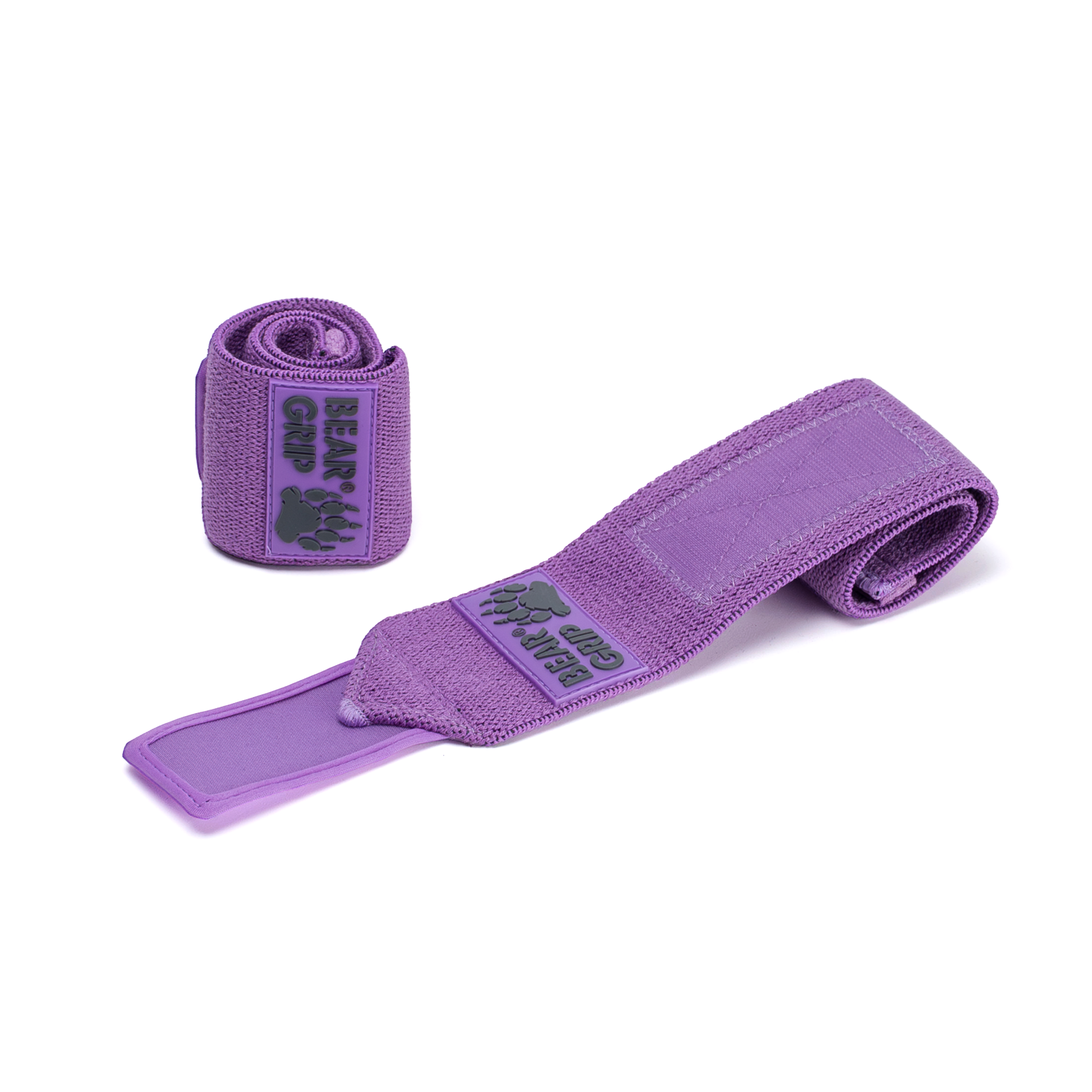 BEAR GRIP pastel purple wrist wraps, one upright and one laid flat, with textured straps and logo patch on a white background.